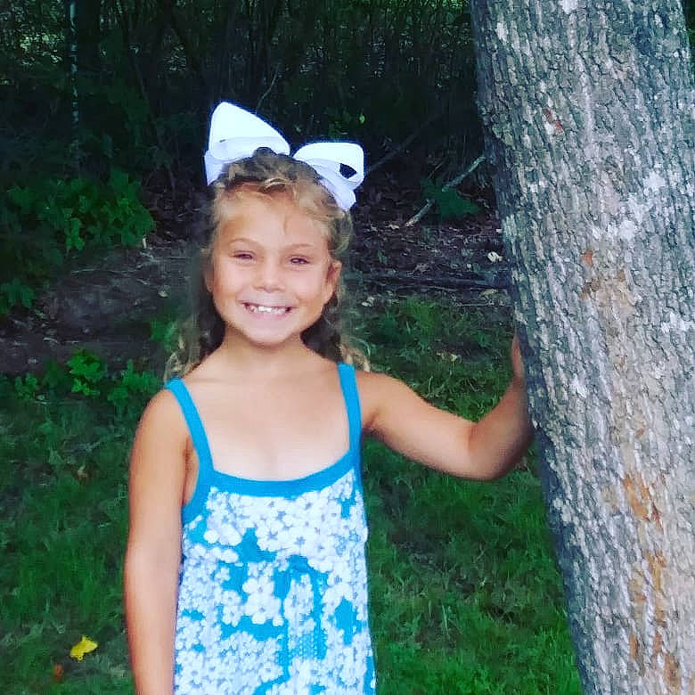 Peyton joined the competition — help win amazing prizes! botany, clothing, electric_blue, goggles, grass, happy, joy, leaf, leisure, nature, people_in_nature, person, plant, recreation, smile, sunglasses, t_shirt, toddler, tree, trunk