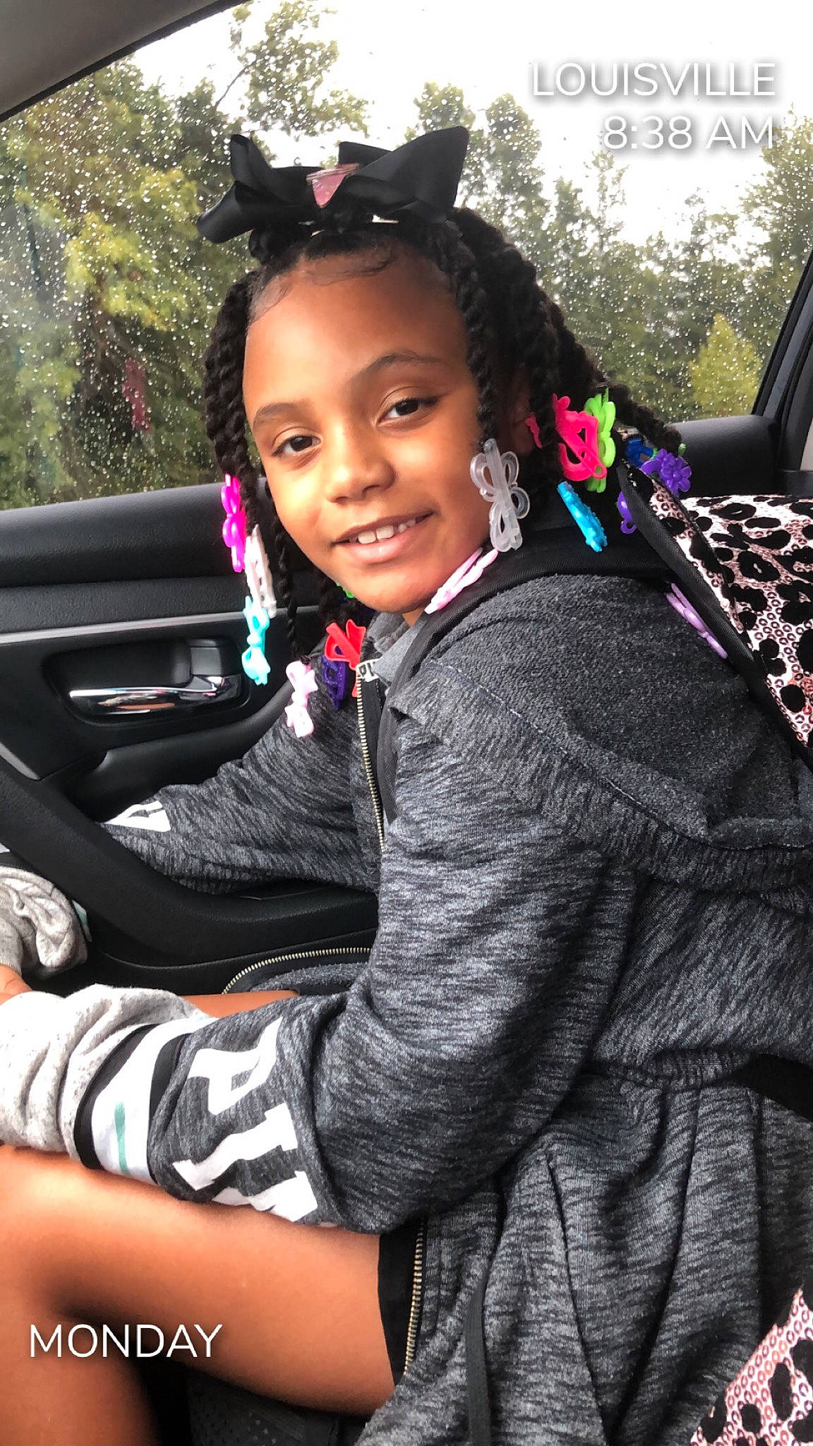 Honesti joined the competition — help win amazing prizes! black_hair, car_seat, child, child_model, hair, hairstyle, long_hair, person, pink, plant, smile, steering_wheel