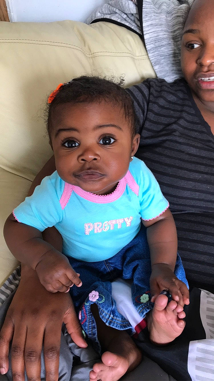 Janiyah joined the competition — help win amazing prizes! baby, cheek, child, eye, face, happy, head, lip, people, person, pink, sitting, skin, smile, toddler