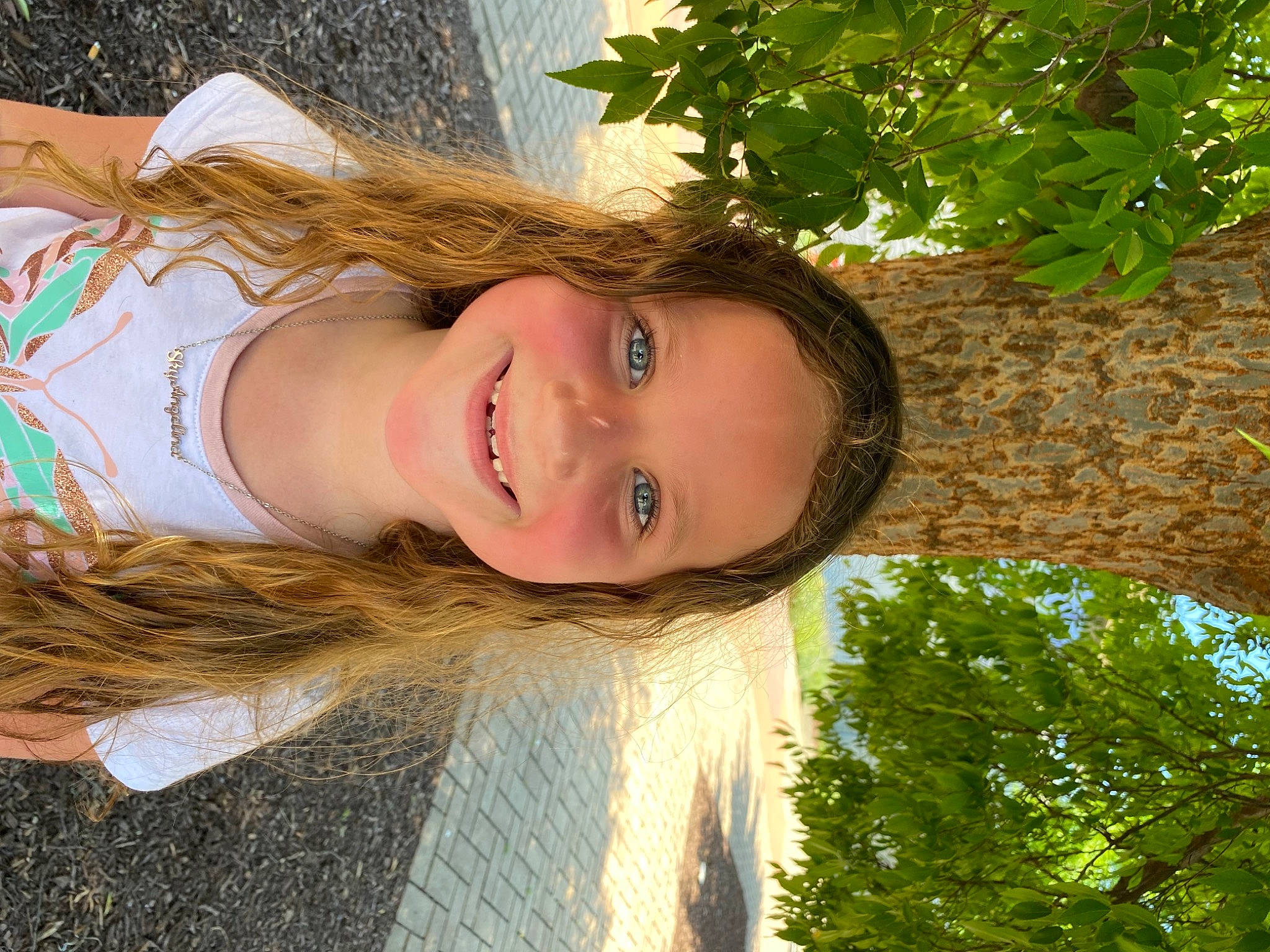 Sky Angelina is registered to the contest to win money with this photo: blond, brown_hair, eye, fawn, flash_photography, fun, grass, happy, joy, leaf, leisure, lip, people_in_nature, person, plant, selfie, smile, sunlight, tree, window