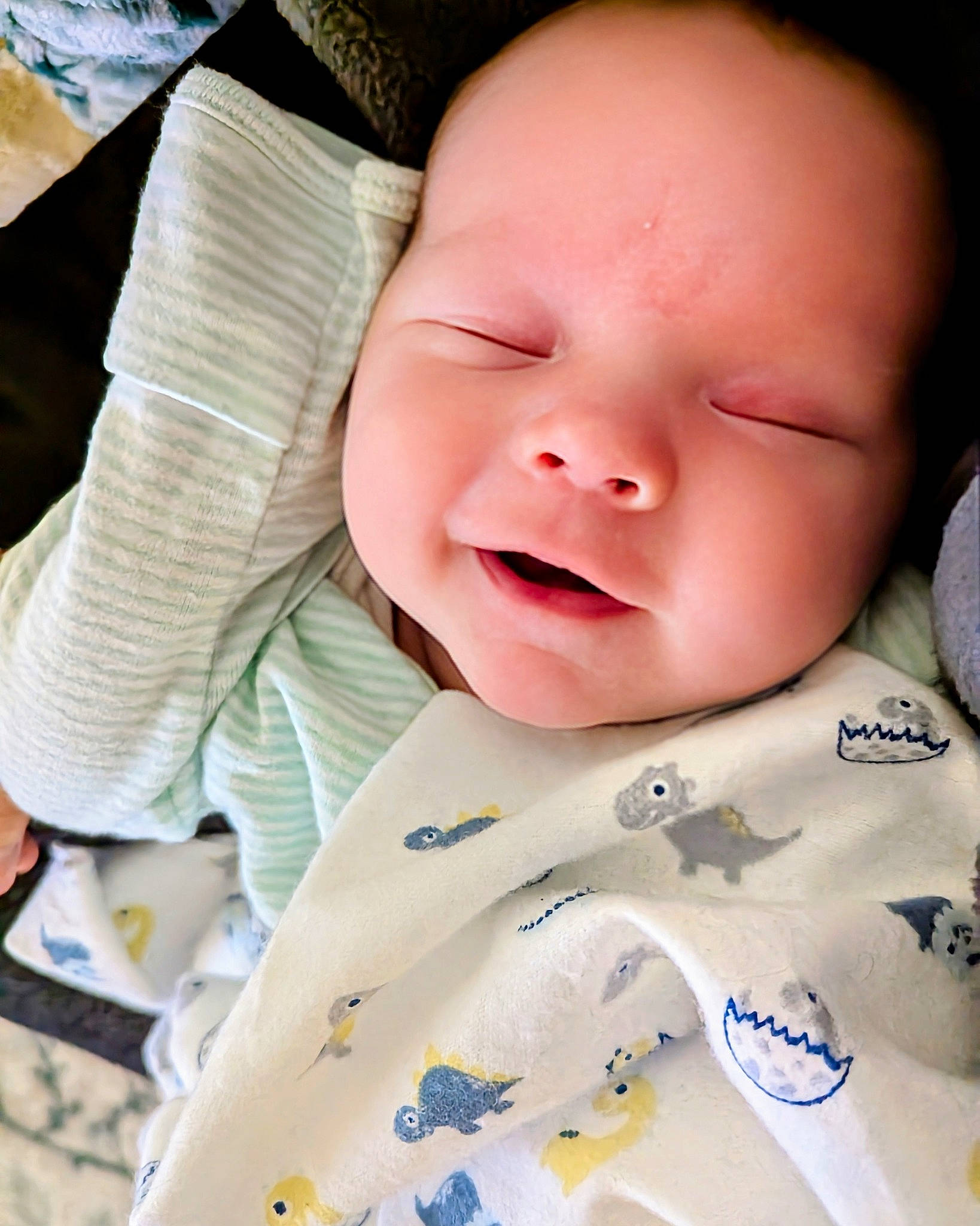 Caiden is registered to the contest to win money with this photo: baby, baby_products, baby_toddler_clothing, cheek, child, collar, comfort, linens, pattern, person, product, skin, sleeve, t_shirt, textile, toddler