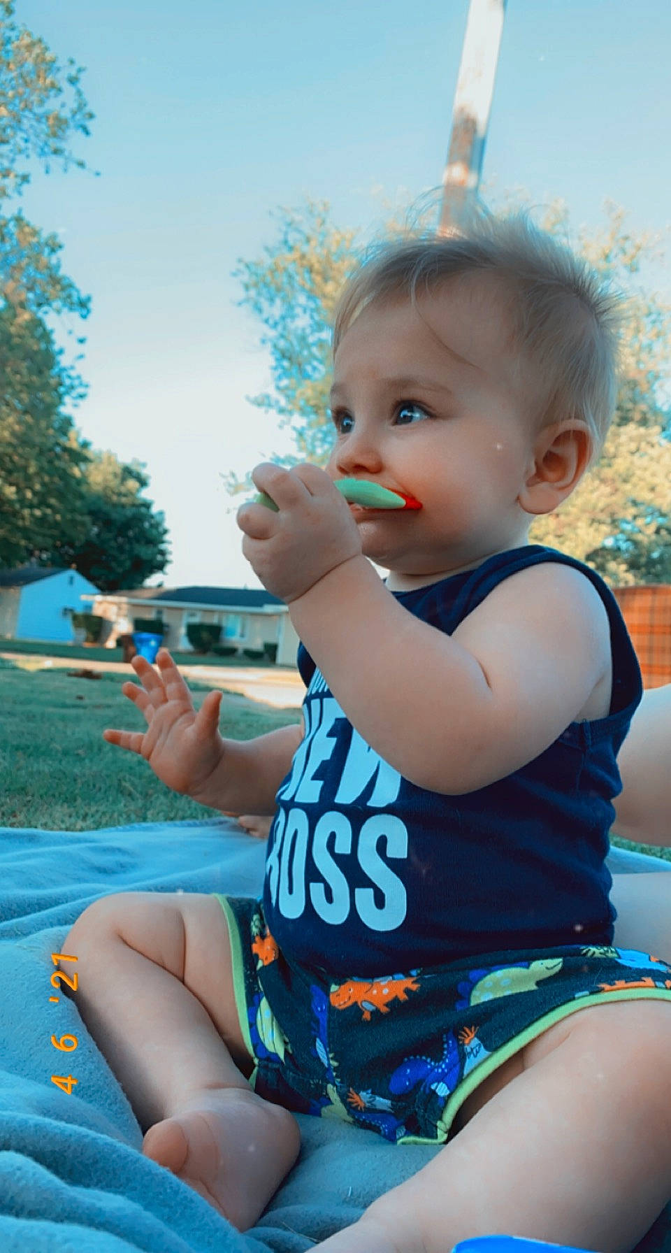 Enzo is registered to the contest to win money with this photo: azure, baby_toddler_clothing, blue, daytime, facial_expression, grass, hairstyle, happy, human, human_body, iris, leg, light, person, photograph, skin, sky, sunlight, toddler, tree