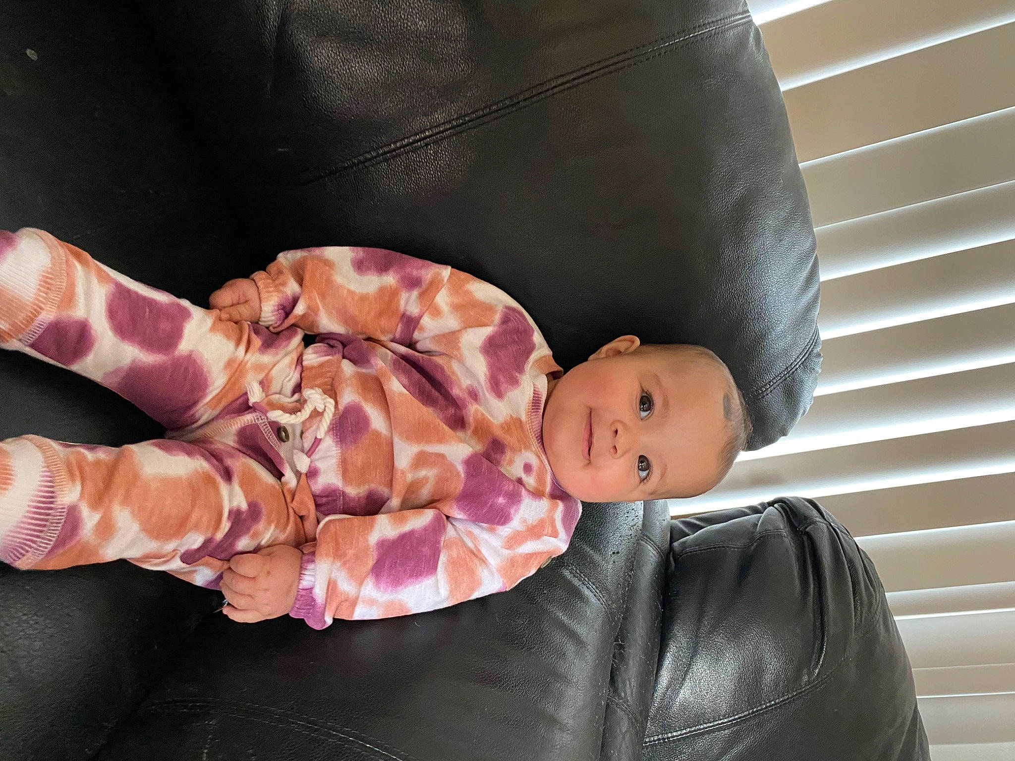 Avalynn is registered to the contest to win money with this photo: baby, baby_products, baby_toddler_clothing, car_seat, child, comfort, eye, fashion_accessory, flesh, foot, human_leg, joy, knee, linens, person, product, sitting, sleeve, textile, thigh