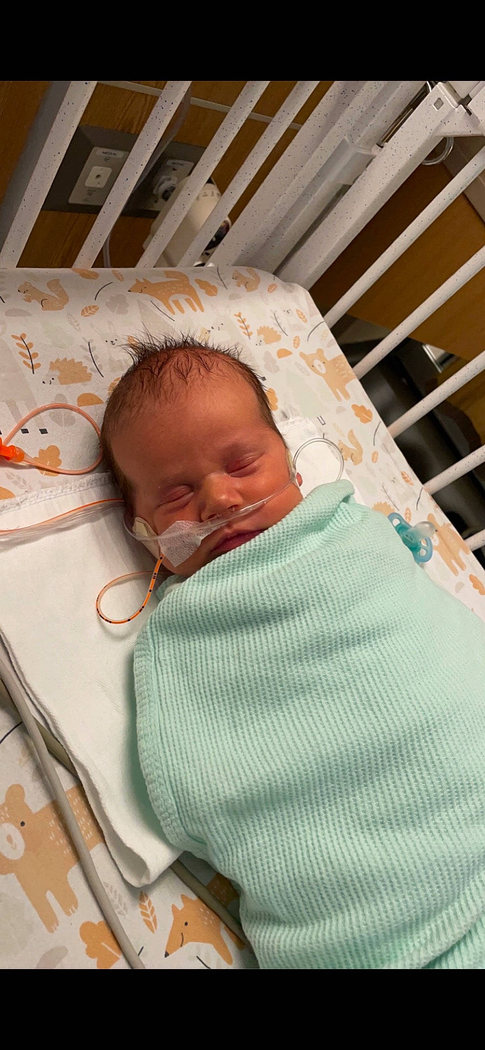 Cyrus is registered to the contest to win money with this photo: baby, baby_products, baby_safety, baby_sleeping, baby_toddler_clothing, bedtime, cheek, child, chin, comfort, hospital, infant_bed, linens, mouth, nose, person, product, room, skin, textile