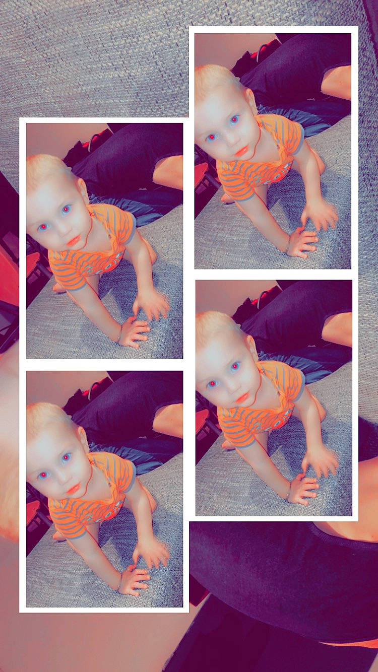 Tiago participe au concours pour gagner de l'argent avec cette photo : arm, azure, baby, baby_toddler_clothing, black, blue, cheek, clothing, face, facial_expression, hand, human, mammal, person, photograph, product, purple, skin, sleeve, vertebrate