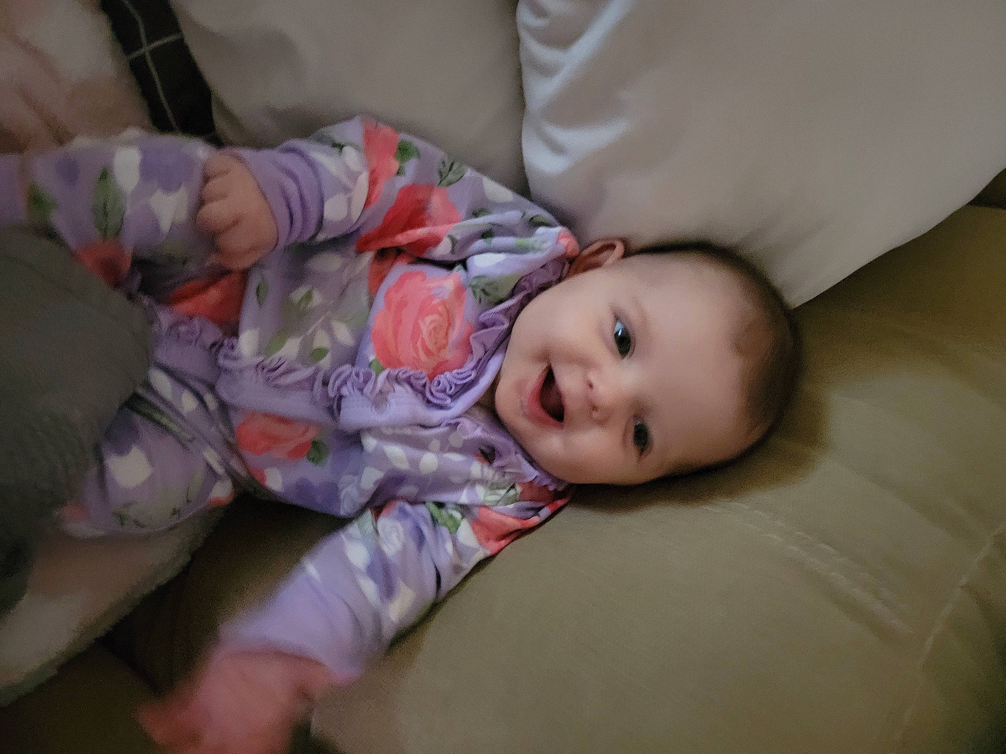 Emorie is registered to the contest to win money with this photo: baby, baby_toddler_clothing, cheek, child, comfort, flooring, fun, hardwood, joy, mouth, nose, person, room, sitting, skin, sleeve, smile, toddler, wood