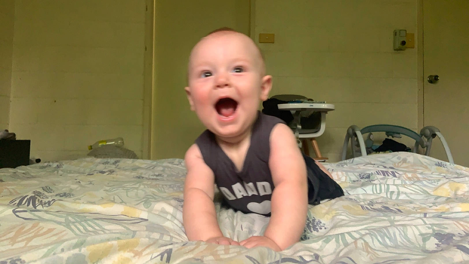 Jack joined the competition — help win amazing prizes! baby, baby_laughing, baby_toddler_clothing, bedding, chair, cheek, child, comfort, eye, flash_photography, flooring, fun, happy, linens, mouth, person, room, sitting, sleeve, smile