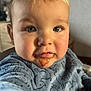 Arthur a rejoint le concours — aidez-le/la à gagner de superbes lots ! toddler, child, face, messy, chocolate, blue_onesie, animal_print, selfie, closeup, curious, indoor, baby, expression, cute, portrait, hand, skin, hair, eyes, pout