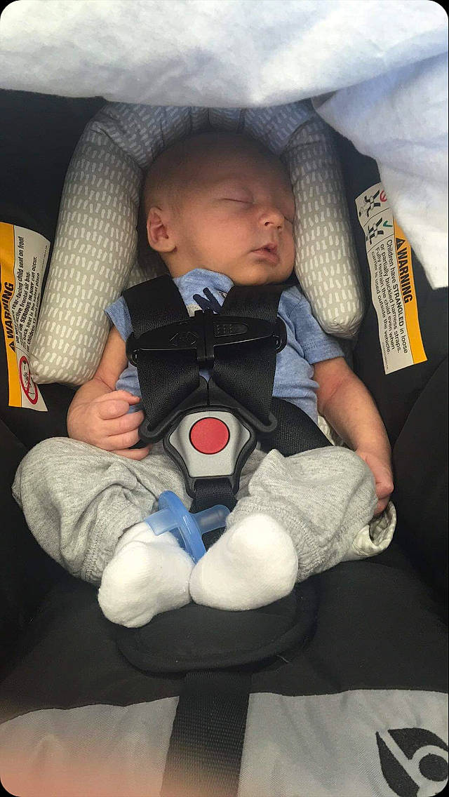 Sebastian is registered to the contest to win money with this photo: baby, baby_carriage, baby_in_car_seat, baby_products, car_seat, child, comfort, nap, person, product, sleep, toddler