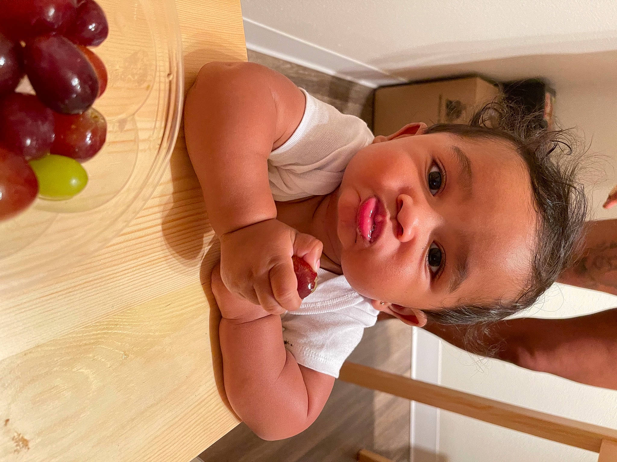 Royale joined the competition — help win amazing prizes! baby_toddler_clothing, chest, comfort, eyelash, finger, flooring, food, gesture, grape, hand, happy, joint, mouth, natural_foods, neck, person, skin, tableware, thumb, toddler