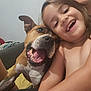 Naya participe au concours pour gagner de l'argent avec cette photo : arm, canine, casual, child, closeup, couch, cute, dog, face, friendship, hair, happy, indoor, person, pet, portrait, skin, smiling, teeth, tongue