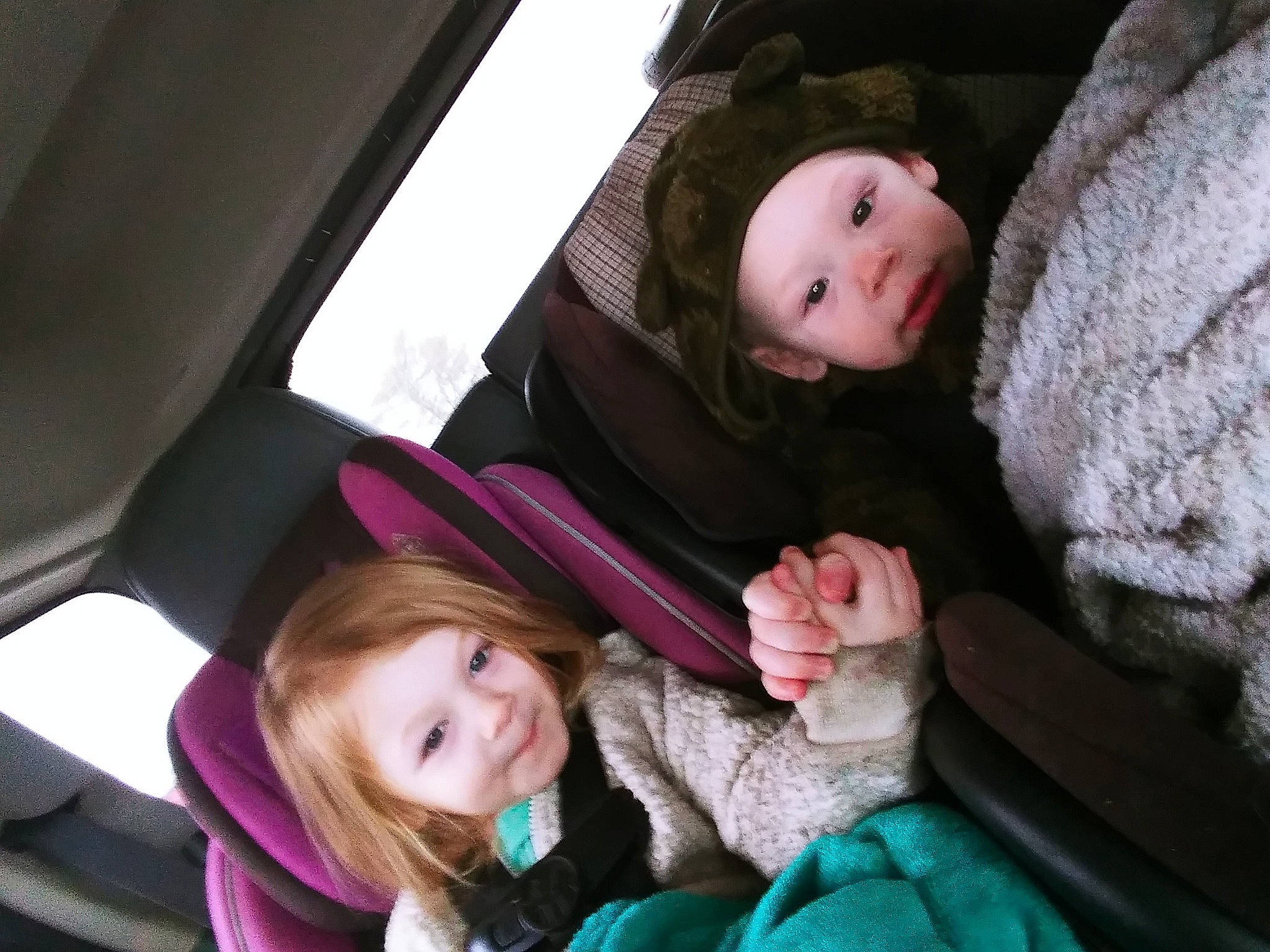 Hayley is registered to the contest to win money with this photo: auto_part, baby, baby_in_car_seat, car_seat, cheek, child, eye, face, head, headwear, joy, mouth, person, pink, skin, smile, toddler