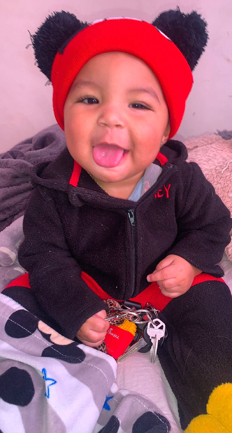 Kaleb joined the competition — help win amazing prizes! baby_toddler_clothing, blue, cap, cheek, face, facial_expression, happy, headwear, human, lip, mouth, nose, organ, outerwear, person, photograph, pink, red, skin, sleeve