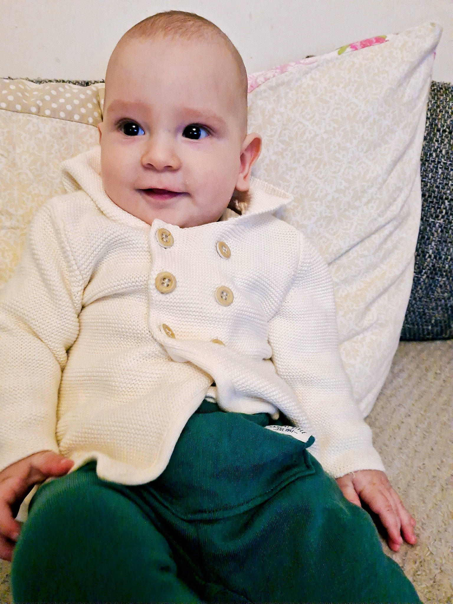 Rares is registered to the contest to win money with this photo: baby, baby_toddler_clothing, cheek, child, chin, collar, comfort, eye, flooring, happy, iris, linens, lip, pattern, person, portrait_photography, sitting, skin, sleeve, smile