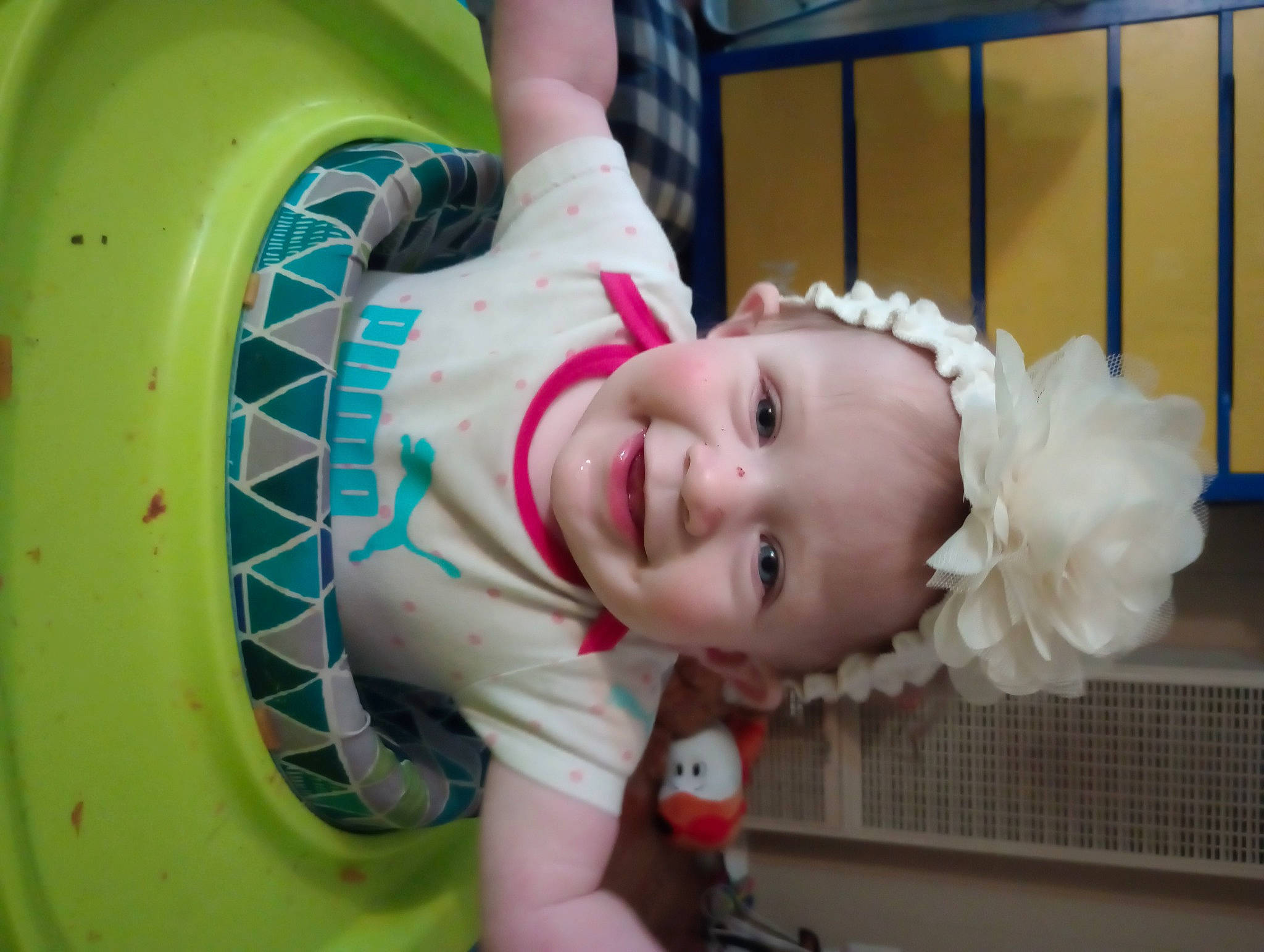 Paizleigh is registered to the contest to win money with this photo: automotive_tire, baby, baby_toddler_clothing, child, circle, event, flash_photography, fun, happy, hat, joy, leisure, mouth, person, pink, product, recreation, skin, smile, toddler