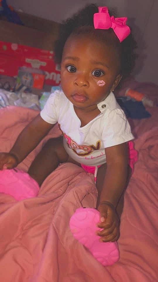 Desiree is registered to the contest to win money with this photo: baby, baby_toddler_clothing, cheek, child, eye, face, head, iris, lip, magenta, person, pink, skin, smile, toddler