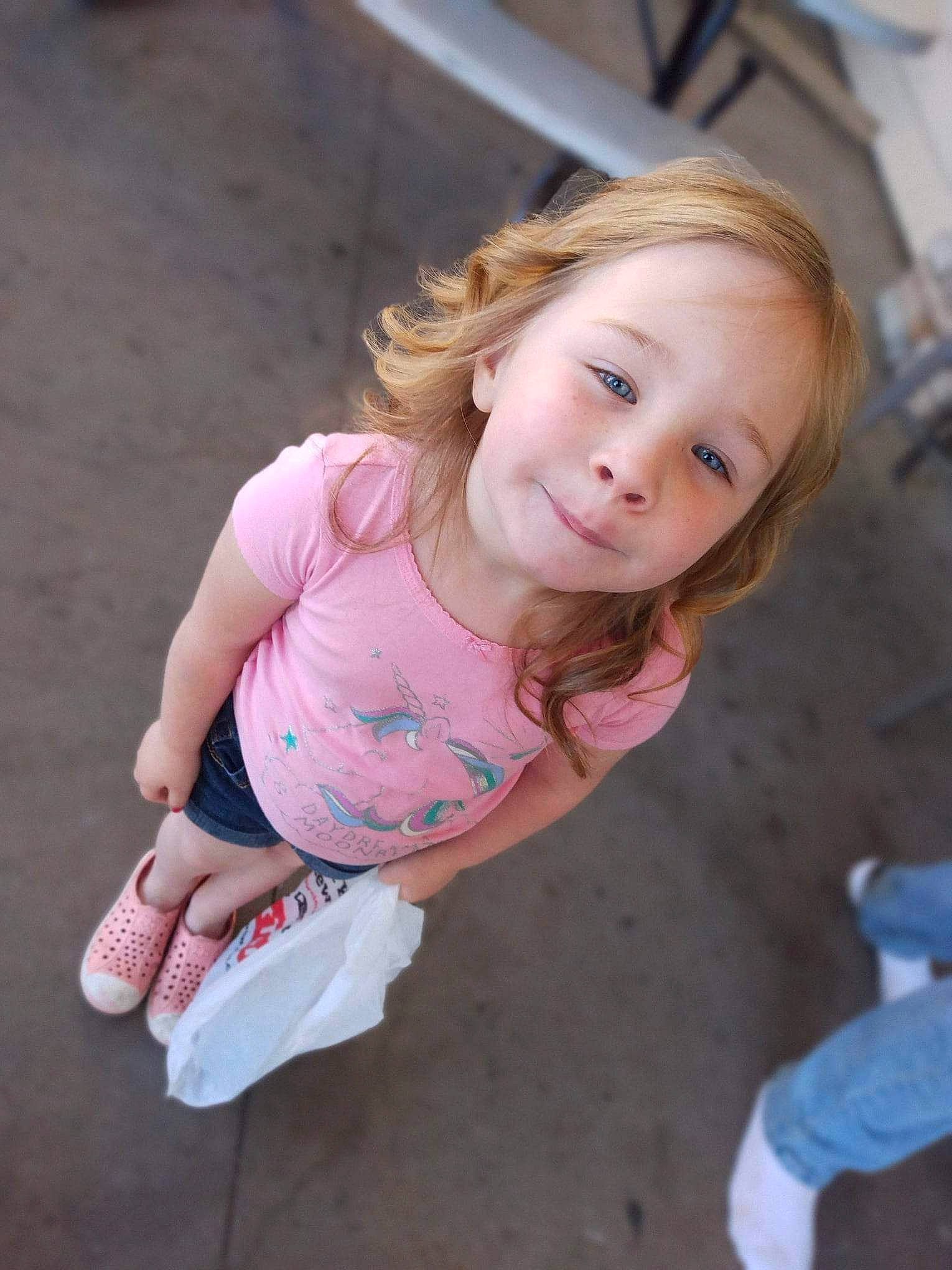 Lydia-ann joined the competition — help win amazing prizes! baby_toddler_clothing, beauty, cheek, child, eye, facial_expression, floor, foot, fun, grass, happy, human_leg, leisure, lip, mouth, person, pink, skin, smile, toddler