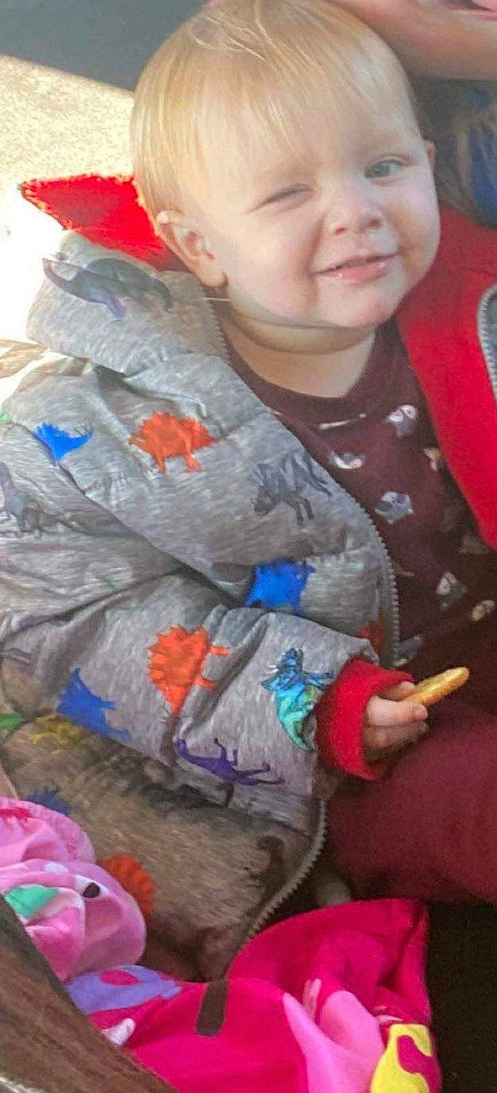 Jaxson is registered to the contest to win money with this photo: baby_toddler_clothing, child, fun, happy, human, human_body, joy, leg, linens, mouth, nose, orange, organ, person, product, red, skin, smile, snapshot, textile