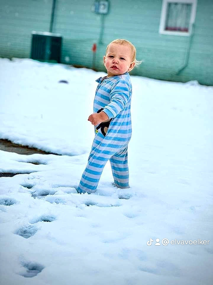 Zane is registered to the contest to win money with this photo: baby, baby_toddler_clothing, child, door, electric_blue, flash_photography, freezing, fun, happy, people_in_nature, person, play, portrait_photography, recreation, sitting, sky, snow, toddler, water, window