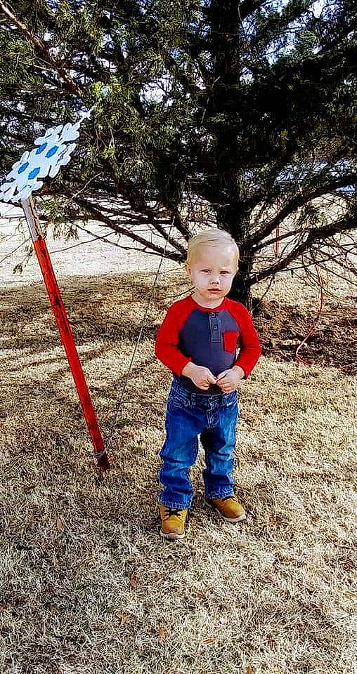 Jax is registered to the contest to win money with this photo: baby, baby_toddler_clothing, child, electric_blue, fun, grass, landscape, leaf, leisure, nature, people_in_nature, person, plant, recreation, sitting, soil, spring, toddler, tree, winter