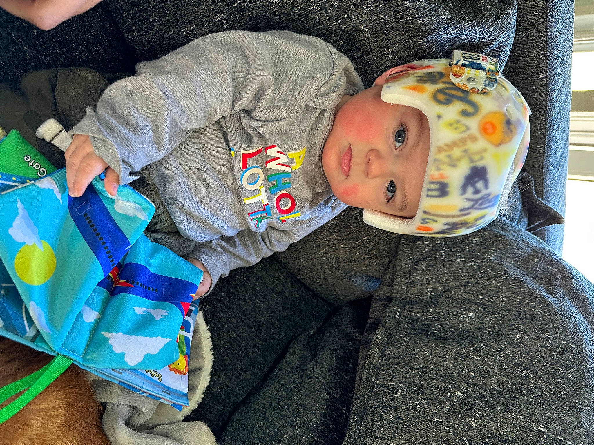 Jaxen joined the competition — help win amazing prizes! baby, baby_products, baby_sleeping, baby_toddler_clothing, baby_toys, child, comfort, electric_blue, fun, headwear, linens, pattern, person, room, sitting, sleeve, toddler, toy