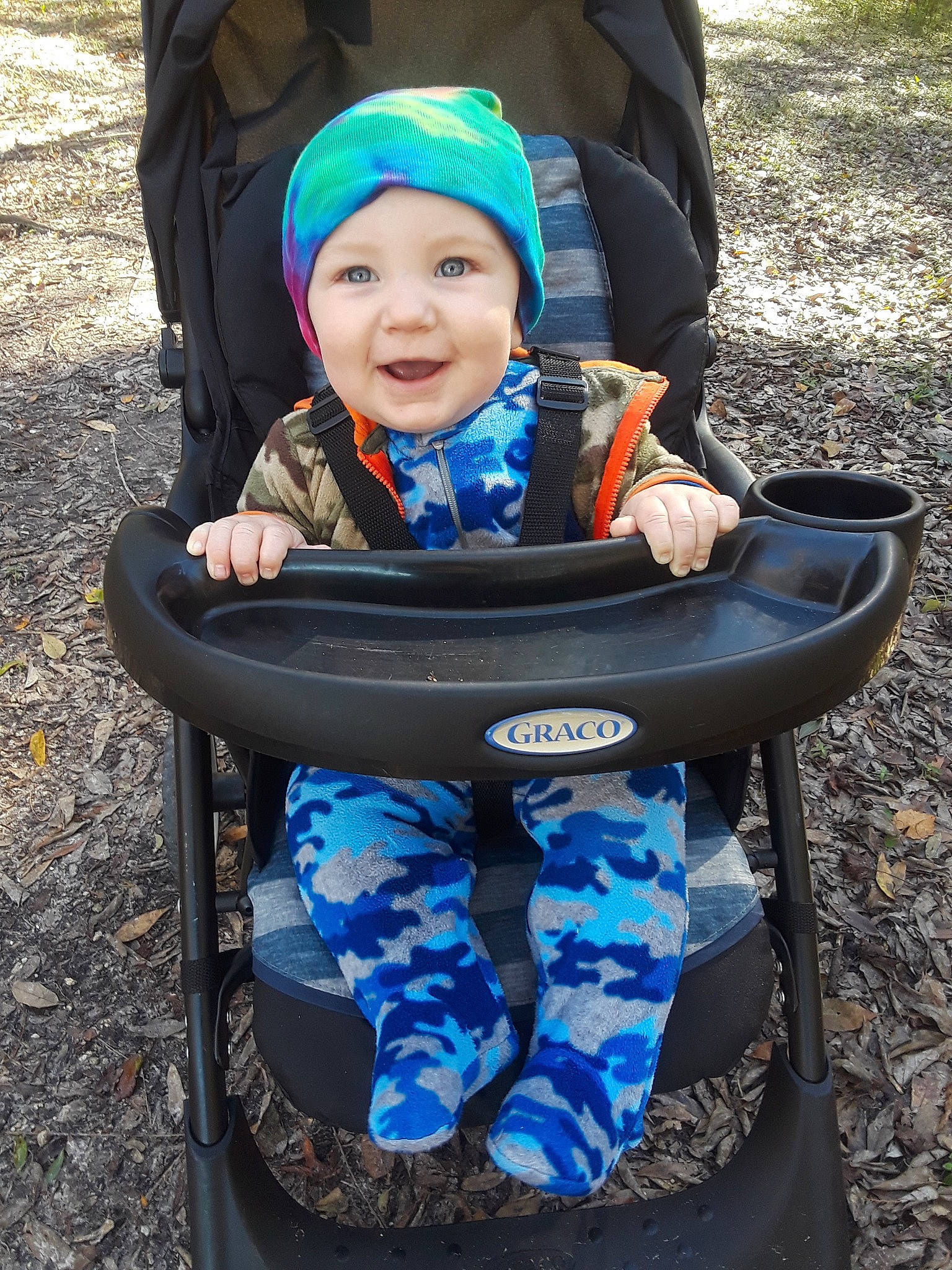 Dino joined the competition — help win amazing prizes! baby_carriage, baby_products, blue, car, child, fun, headgear, headwear, joy, person, personal_protective_equipment, product, recreation, toddler, vacation, vehicle, water