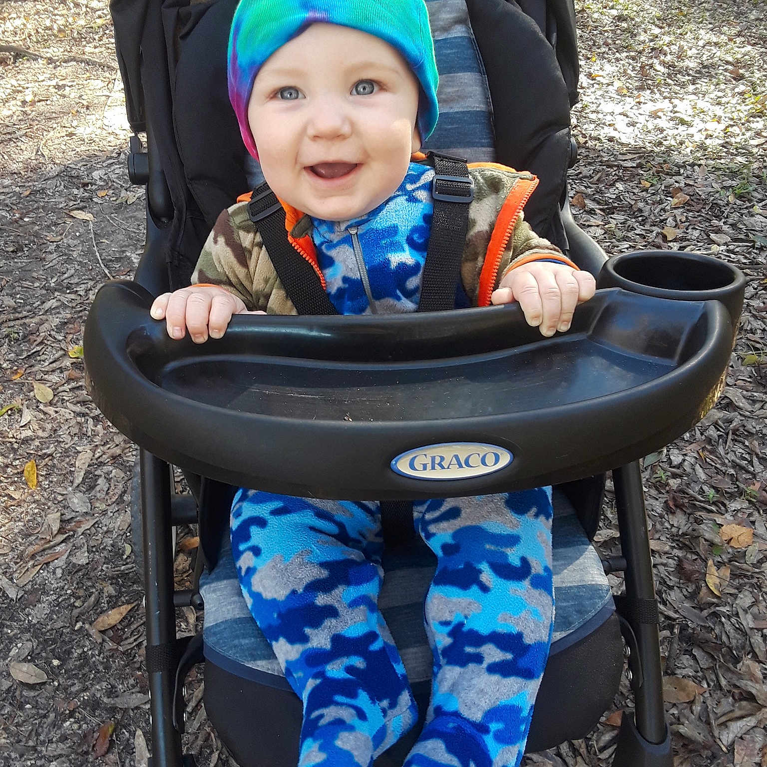 Dino joined the competition — help win amazing prizes! baby_carriage, baby_products, blue, car, child, fun, headgear, headwear, joy, person, personal_protective_equipment, product, recreation, toddler, vacation, vehicle, water