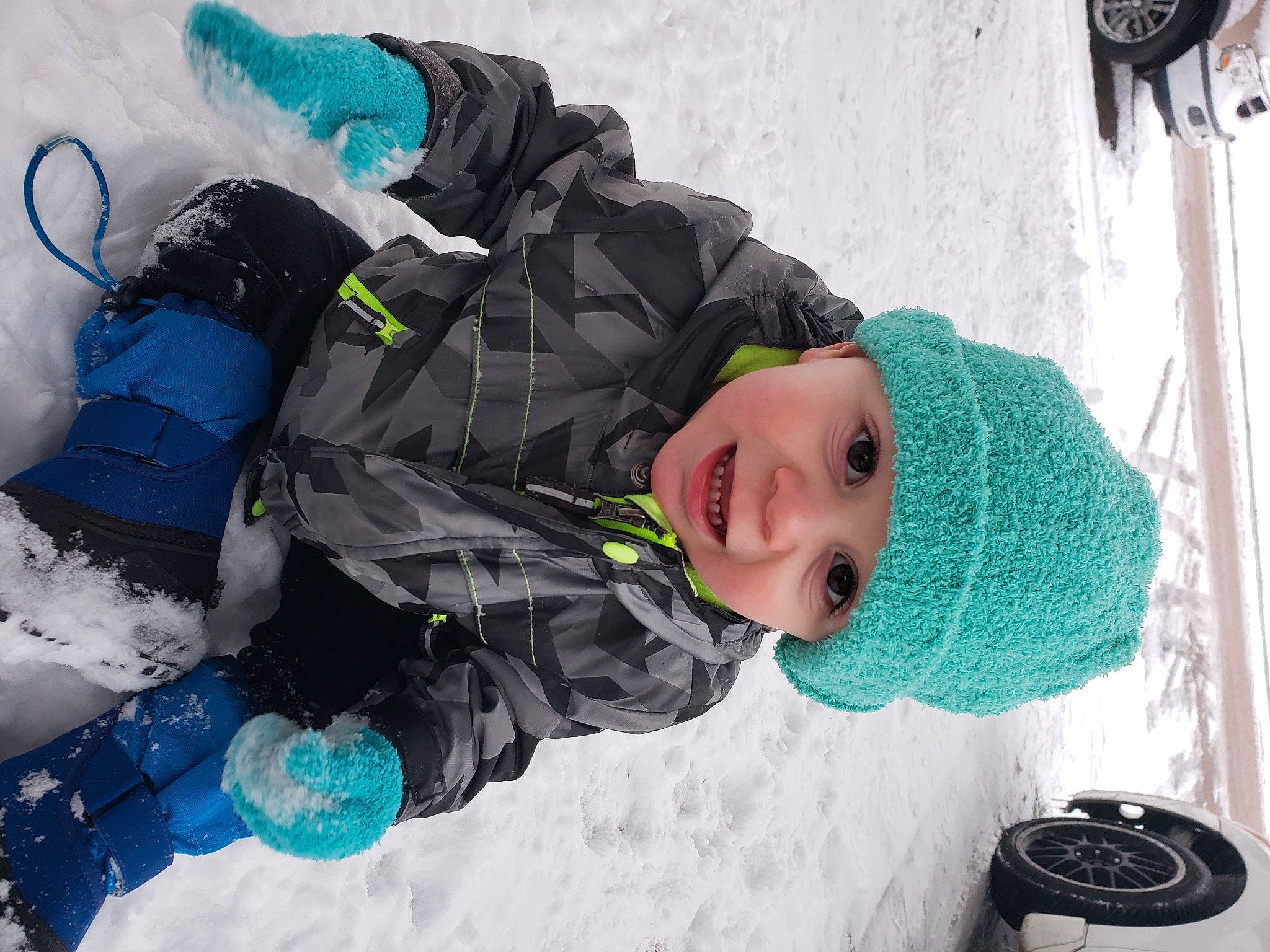 Lucius joined the competition — help win amazing prizes! blue, cap, electric_blue, freezing, fun, glove, green, headwear, ice_cap, jacket, knit_cap, leisure, person, personal_protective_equipment, photograph, recreation, smile, snapshot, snow, toddler