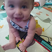 Azalea joined the competition — help win amazing prizes! baby, child, play_mat, toy, mirror, floor, indoor, colorful, smiling, happy, sitting, clothing, arm, hand, foot, reflection, background, carpet, infant, person