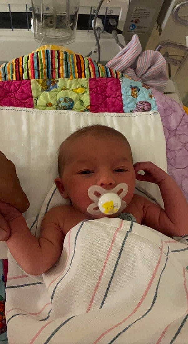 Addalynn is registered to the contest to win money with this photo: baby, baby_products, baby_safety, baby_toddler_clothing, cheek, child, comfort, eye, hand, happy, head, iris, linens, lip, mouth, nose, person, room, skin, toddler