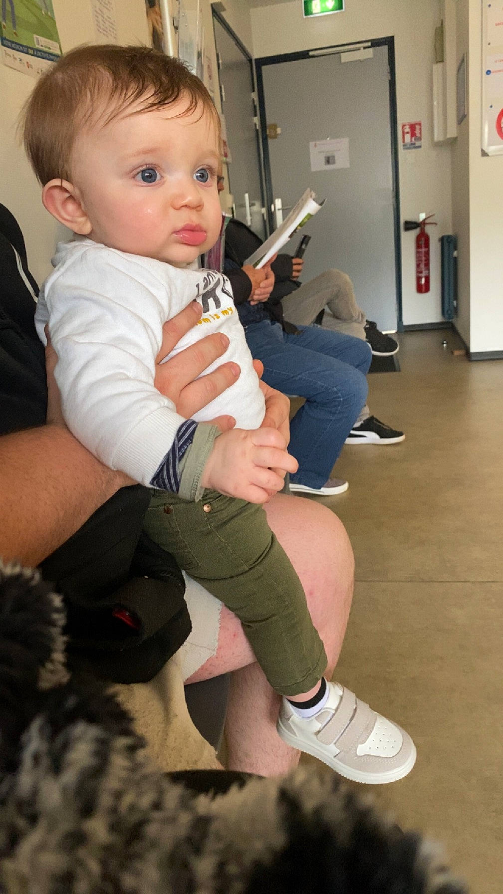 Kayden participe au concours pour gagner de l'argent avec cette photo : arm, baby, baby_toddler_clothing, cheek, chin, eye, finger, flooring, hair, hand, joint, knee, lap, leg, person, shoe, shoulder, skin, sneakers, thigh