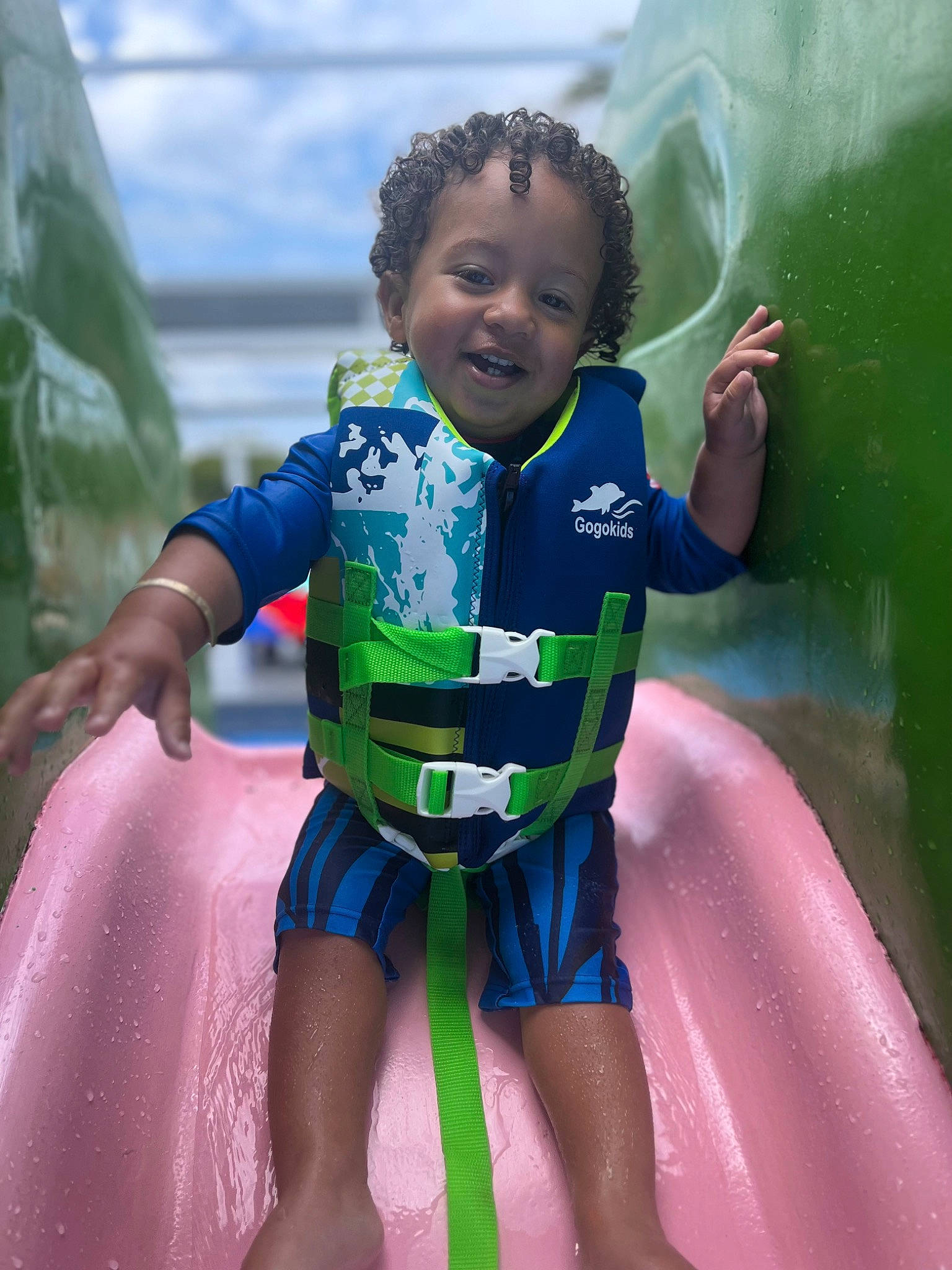 Cairo joined the competition — help win amazing prizes! aqua, azure, baby_toddler_clothing, child, cloud, electric_blue, fun, grass, happy, inflatable, leisure, people_in_nature, person, personal_protective_equipment, play, product, recreation, sky, smile, summer