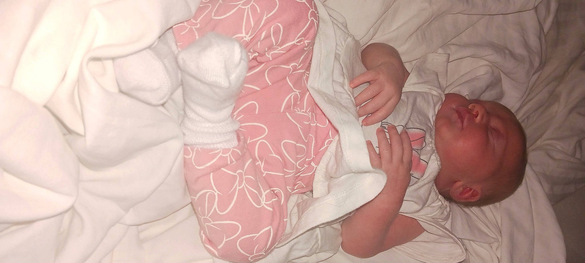 Eva is registered to the contest to win money with this photo: arm, chest, comfort, ear, finger, gesture, hand, human_body, joint, lip, mouth, muscle, nail, neck, nose, person, pink, skin, sleeve, textile