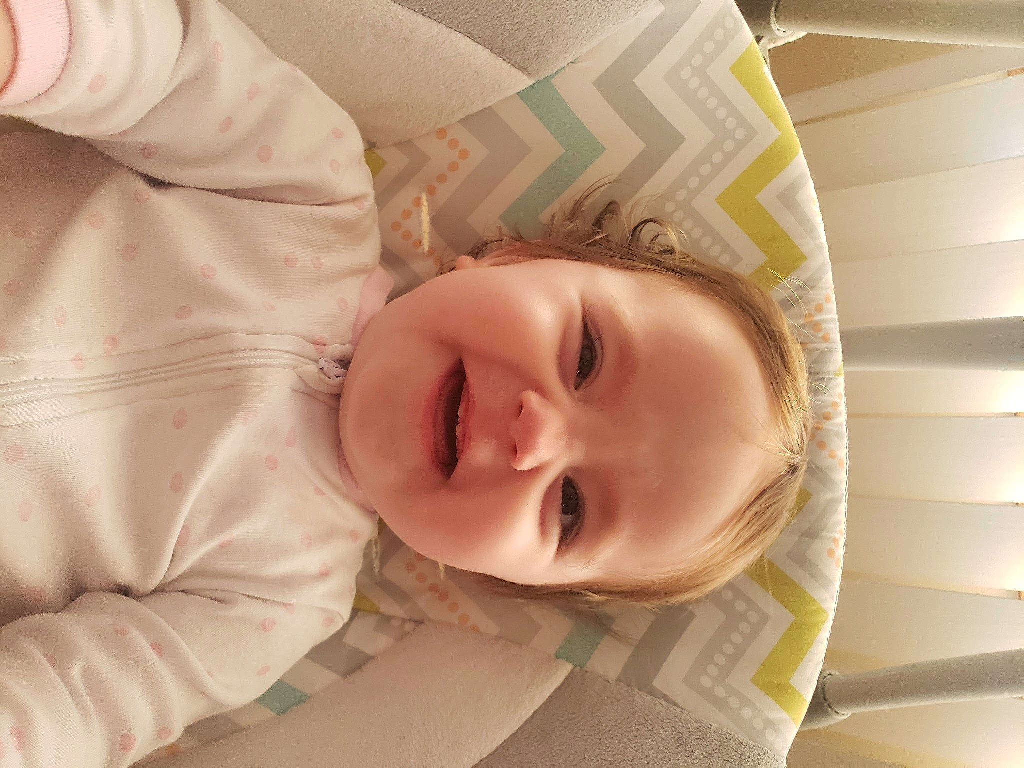 Emily is registered to the contest to win money with this photo: baby, baby_laughing, baby_products, baby_safety, baby_toddler_clothing, cheek, child, comfort, eyebrow, eyelash, fun, happy, linens, nose, person, room, skin, sleeve, smile, toddler