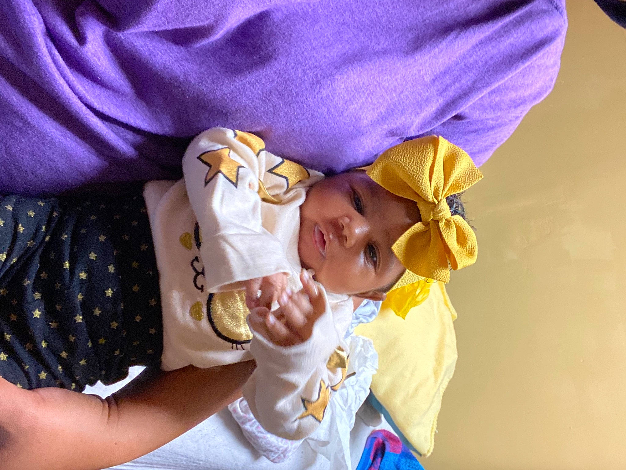 Ahmani joined the competition — help win amazing prizes! arm, baby, baby_products, baby_toddler_clothing, child, comfort, event, finger, fun, gesture, hand, happy, hat, headwear, person, room, toddler, tradition
