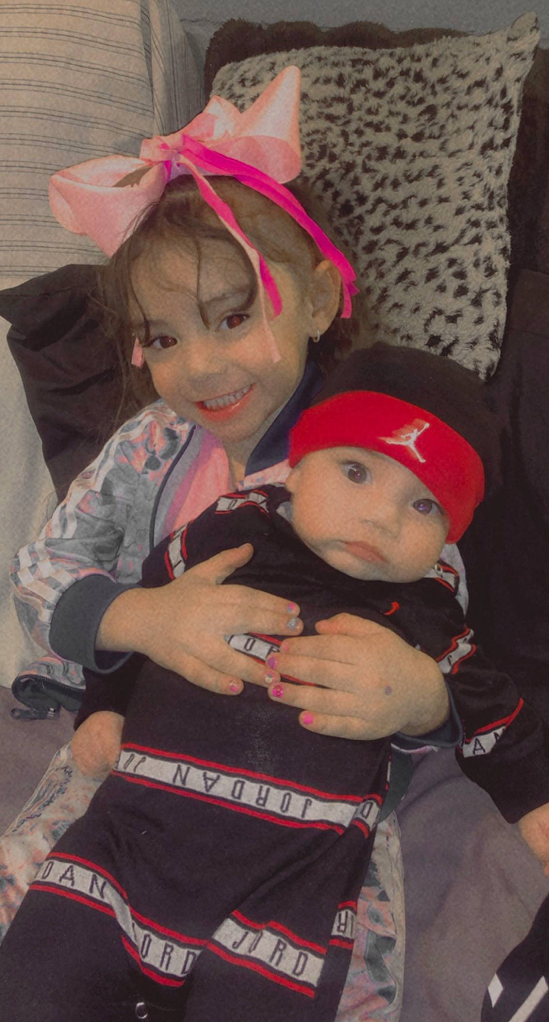 Josue joined the competition — help win amazing prizes! baby, baseball_cap, black, cap, child, costume, event, eye, fun, happy, head, headgear, headwear, joy, person, personal_protective_equipment, pink, red, skin, smile