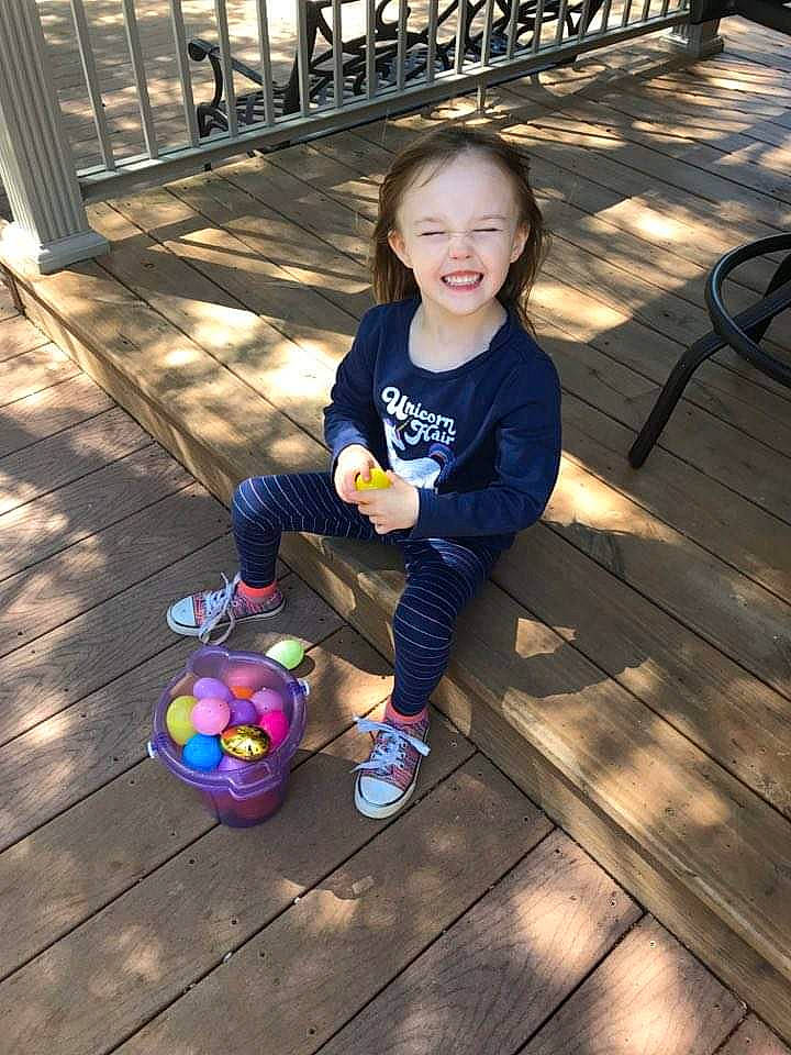 Anna is registered to the contest to win money with this photo: ball, child, fun, happy, joy, person, play, smile, toddler, vacation