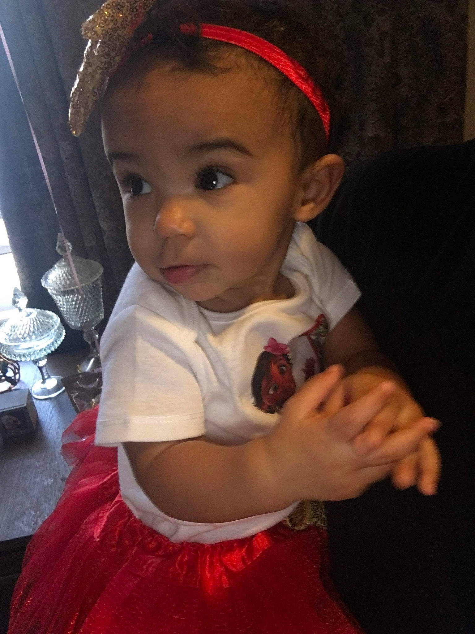 Talia is registered to the contest to win money with this photo: baby, baby_toddler_clothing, cheek, child, child_model, costume, costume_accessory, day_dress, embellishment, hair_accessory, headband, headgear, headpiece, lip, person, skin, toddler