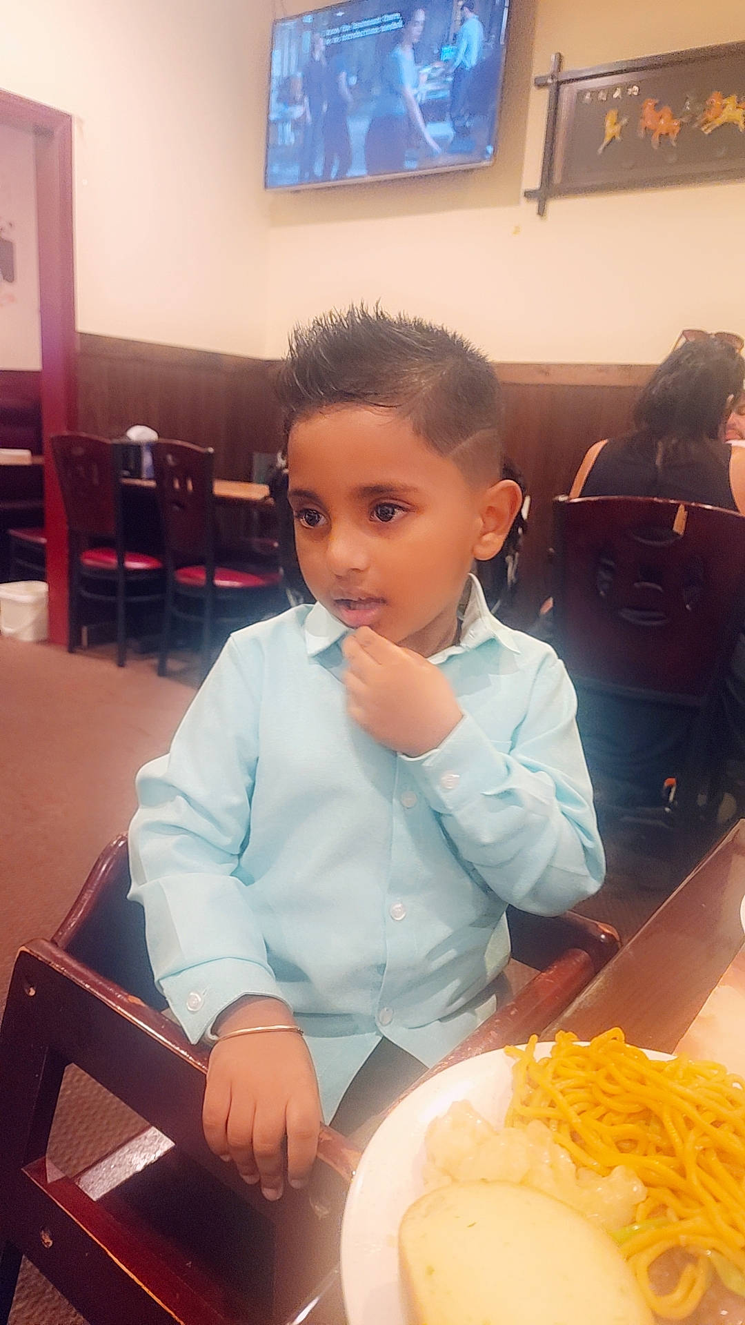 Dominick Jeonarine joined the competition — help win amazing prizes! chair, child, comfort_food, cuisine, dish, event, fashion_design, formal_wear, fun, ingredient, job, junk_food, person, picture_frame, room, sitting, tableware, television, tie, uniform