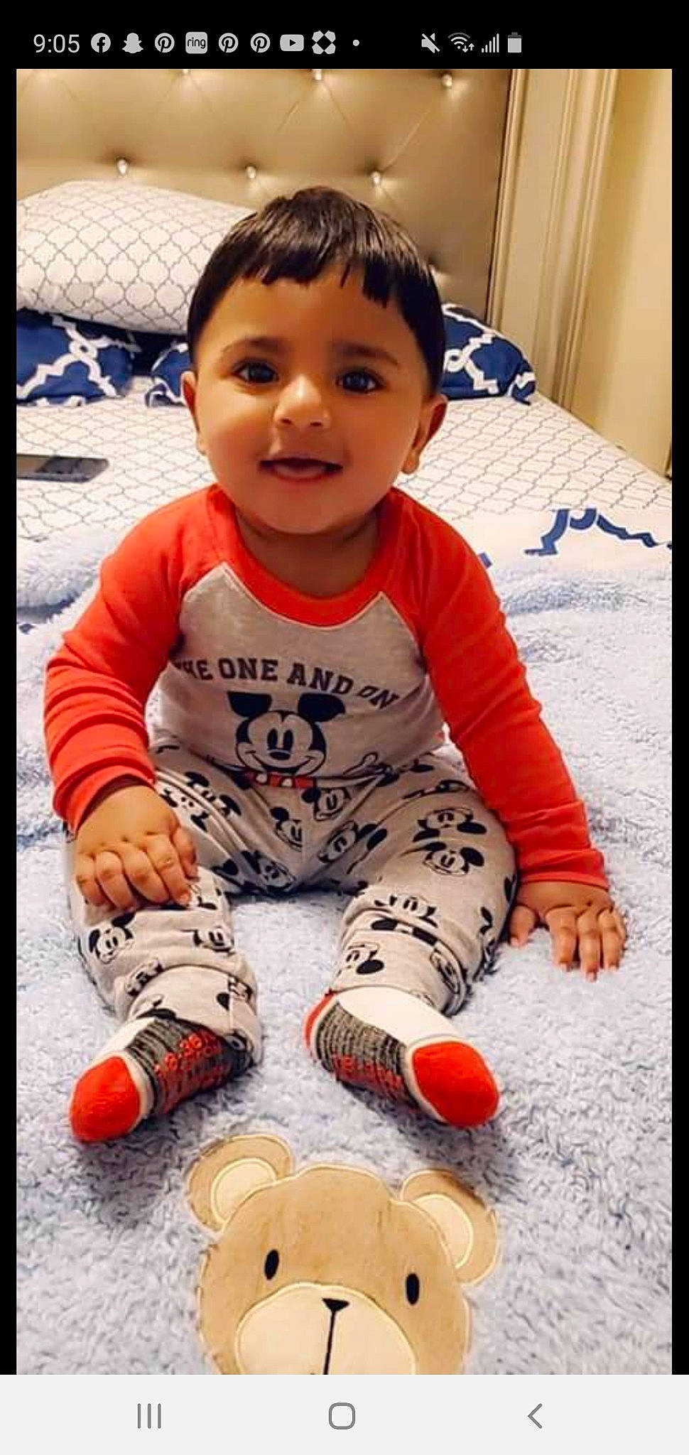 Dominick Jeonarine is registered to the contest to win money with this photo: baby, baby_toddler_clothing, cheek, child, comfort, face, finger, flooring, fun, happy, head, pattern, person, photograph, sitting, sleeve, smile, snapshot, t_shirt, textile