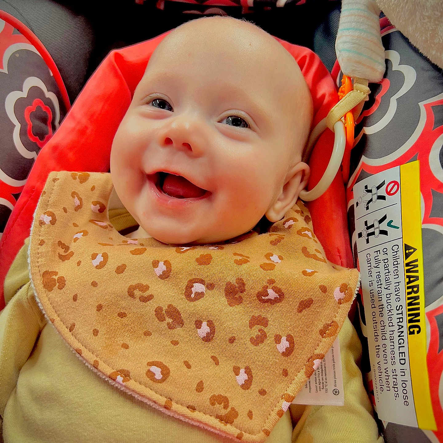 Ariella is registered to the contest to win money with this photo: baby, babylaughing, bed, bib, blanket, cushion, face, furniture, happy, head, homedecor, laughing, newborn, person, photography, portrait, quilt, smile
