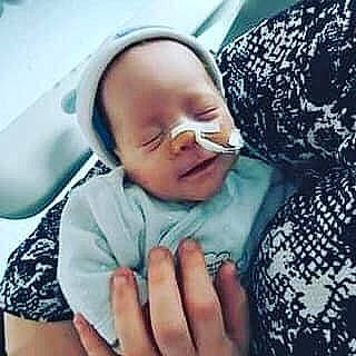 Sasha participe au concours pour gagner de l'argent avec cette photo : azure, baby, baby_products, baby_sleeping, baby_toddler_clothing, cheek, child, comfort, cool, eye, finger, gesture, happy, mouth, nose, person, skin, sleeve, smile, thumb