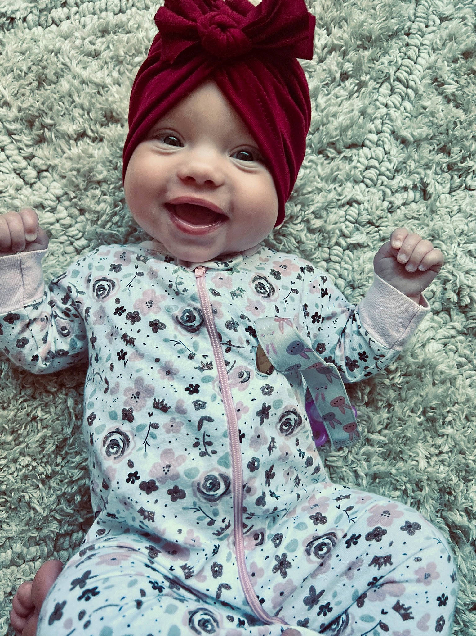 Tatum is registered to the contest to win money with this photo: baby, baby_toddler_clothing, cap, cool, dress, eye, face, facial_expression, gesture, happy, head, headgear, headwear, jacket, outerwear, person, photograph, pink, skin, sleeve