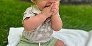 Romeo joined the competition — help win amazing prizes! baby, child, hat, outdoor, grass, blanket, playful, cute, green_shorts, smiling, portrait, hands, feet, nature, daylight, sitting, young, person, hat_band, garden