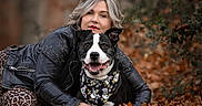 Harley a rejoint le concours — aidez-le/la à gagner de superbes lots ! animal, autumn, bandana, black_and_white_dog, close_up, companion, dog, fallen_leaves, fashion, happy, leather_jacket, leopard_print, nature, outdoor, pet, photography, portrait, smiling, woman, woodland