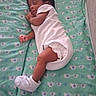 Josiah is registered to the contest to win money with this photo: baby, bed, blanket, child, cute, foot, hand, head, indoors, infant, newborn, onesie, pattern, peaceful, resting, skin, sleeping, sock, soft, young