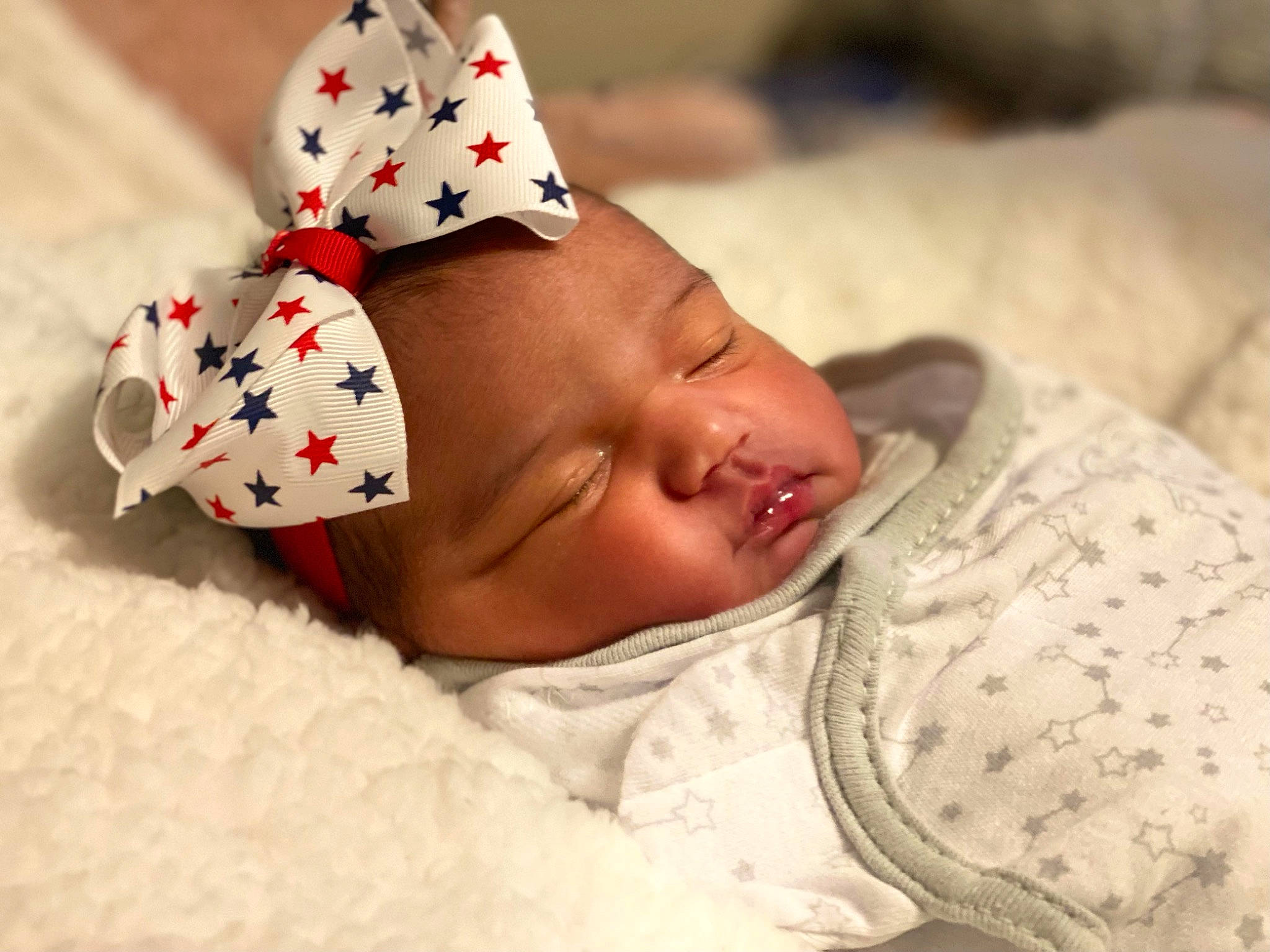 Alaïa is registered to the contest to win money with this photo: baby, baby_sleeping, baby_toddler_clothing, bedtime, cap, carmine, child, comfort, costume_hat, event, face, fashion_accessory, happy, hat, head, linens, pattern, person, skin, sleeve