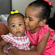 Samaya joined the competition — help win amazing prizes! child, baby, sister, hug, kiss, love, family, indoor, portrait, cute, smile, dress, bow, affection, toddler, head, face, skin, happy, closeup