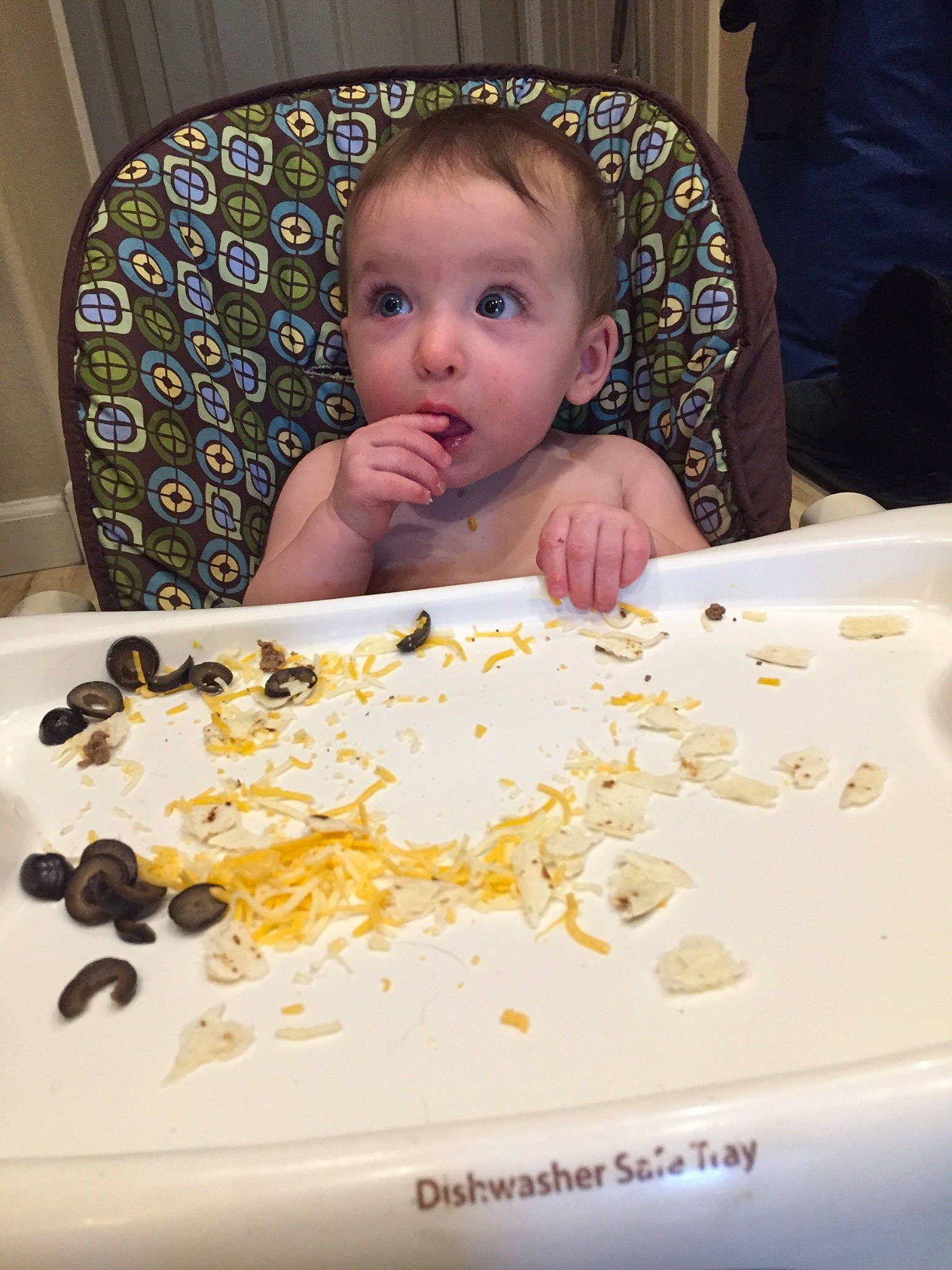 Lily is registered to the contest to win money with this photo: baby, cake, child, comfort_food, cuisine, dish, eating, food, person, surprise, sweetness, toddler