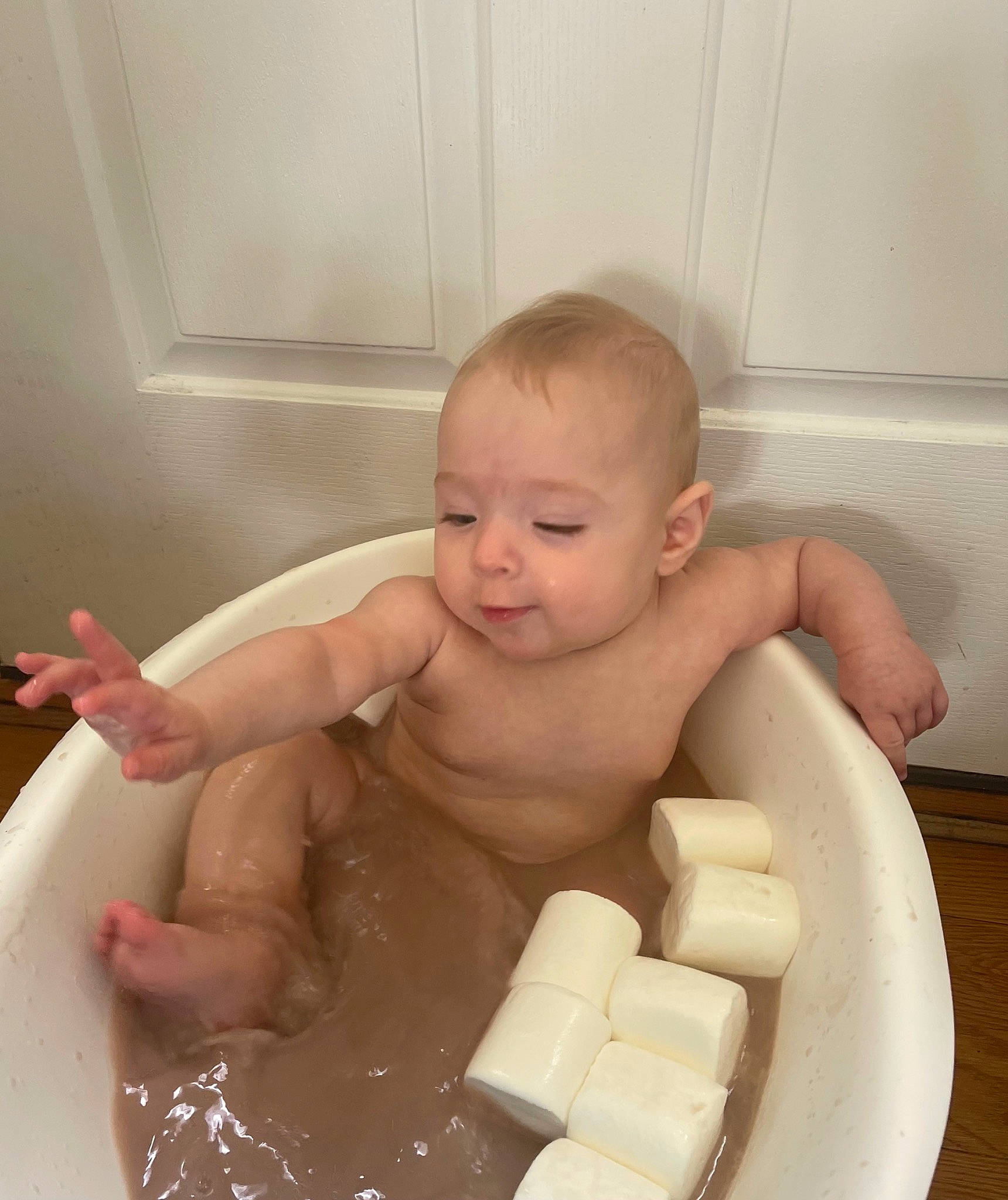 Raegan is registered to the contest to win money with this photo: baby, baby_bathing, baby_products, bathing, bathroom, bathtub, cheese, chest, child, eyelash, face, finger, fluid, hand, person, personal_care, plumbing, plumbing_fixture, thumb, toddler